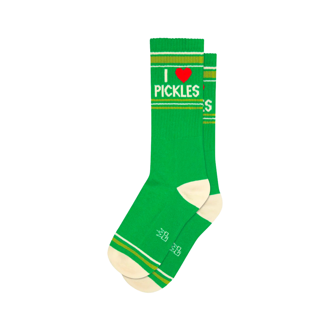 Green socks with green and white stripes and text "I Love Pickles". Savor the salty, crunchy tang of pickles on your hotdog, burger, fried, or fresh from the jar. There is no wrong way to rock the pickle-life! Crafted from Cotton/Nylon/Spandex blend, our US-made socks fit most. Join the pickle-party!