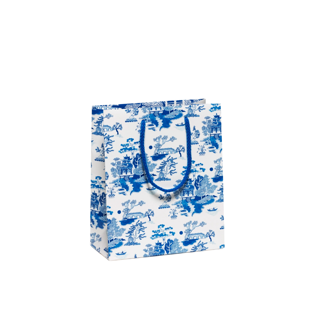 This small gift bag measures 8 x 4 x 9.5 inches and is crafted from heavyweight coated paper with a cotton rope handle. The bag features the beautiful illustrations of Becca Stadtlander.