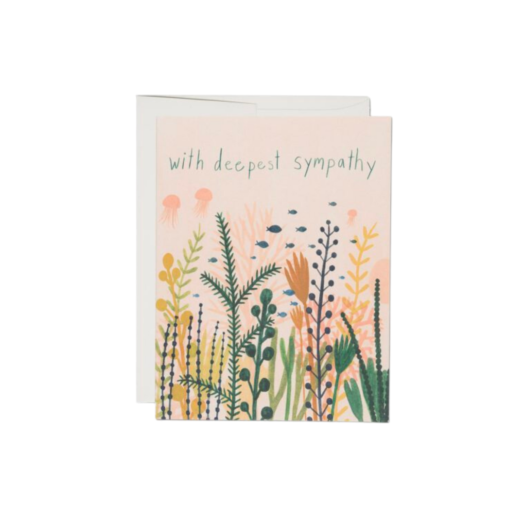 Floral design on pink background with text reading "With Deepest Sympathy". This card is printed on 100lb heavyweight card stock and measures 4.25 x 5.5 inches. Illustrated by Kate Pugsley, each card is offset printed in the USA on recycled paper. It's blank inside for you to craft your own words.