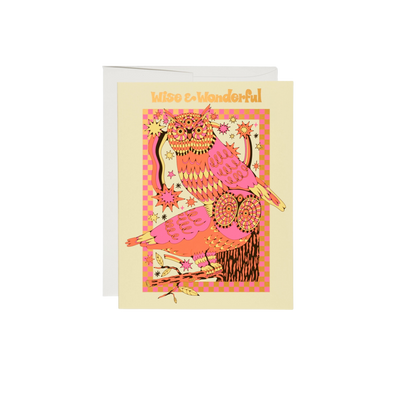 Colorful illustration of two owls with gold text reading "Wise & Wonderful". This 5.5 x 4.25 inch card features blank interiors, is offset printed and foil stamped. It is crafted from 100lb heavyweight card stock and illustrated by Krista Perry. It is printed in the USA on recycled paper.