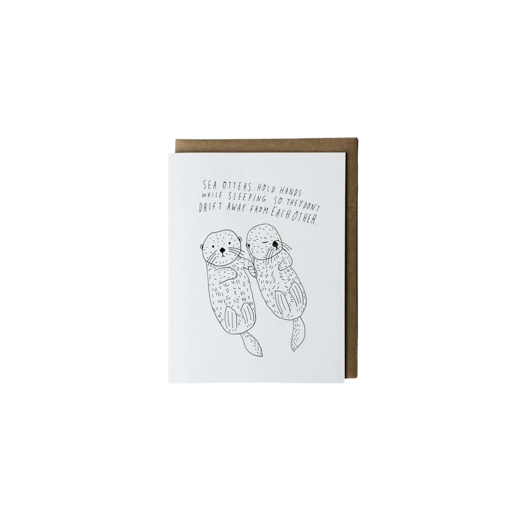 Sea Otters Holding Hands Card