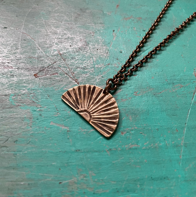 Brass Sunburst Necklace (Facing Downward)