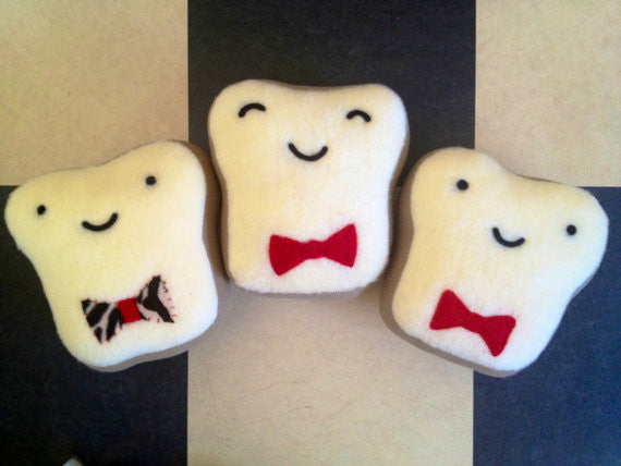 Mr. Toasty Bow Tie Stuffed Plush Pillow